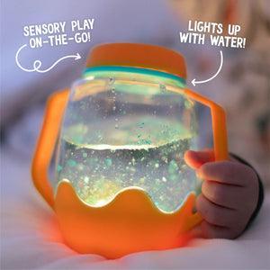 Glo Pals sensory play jar oranje 18 mnd+