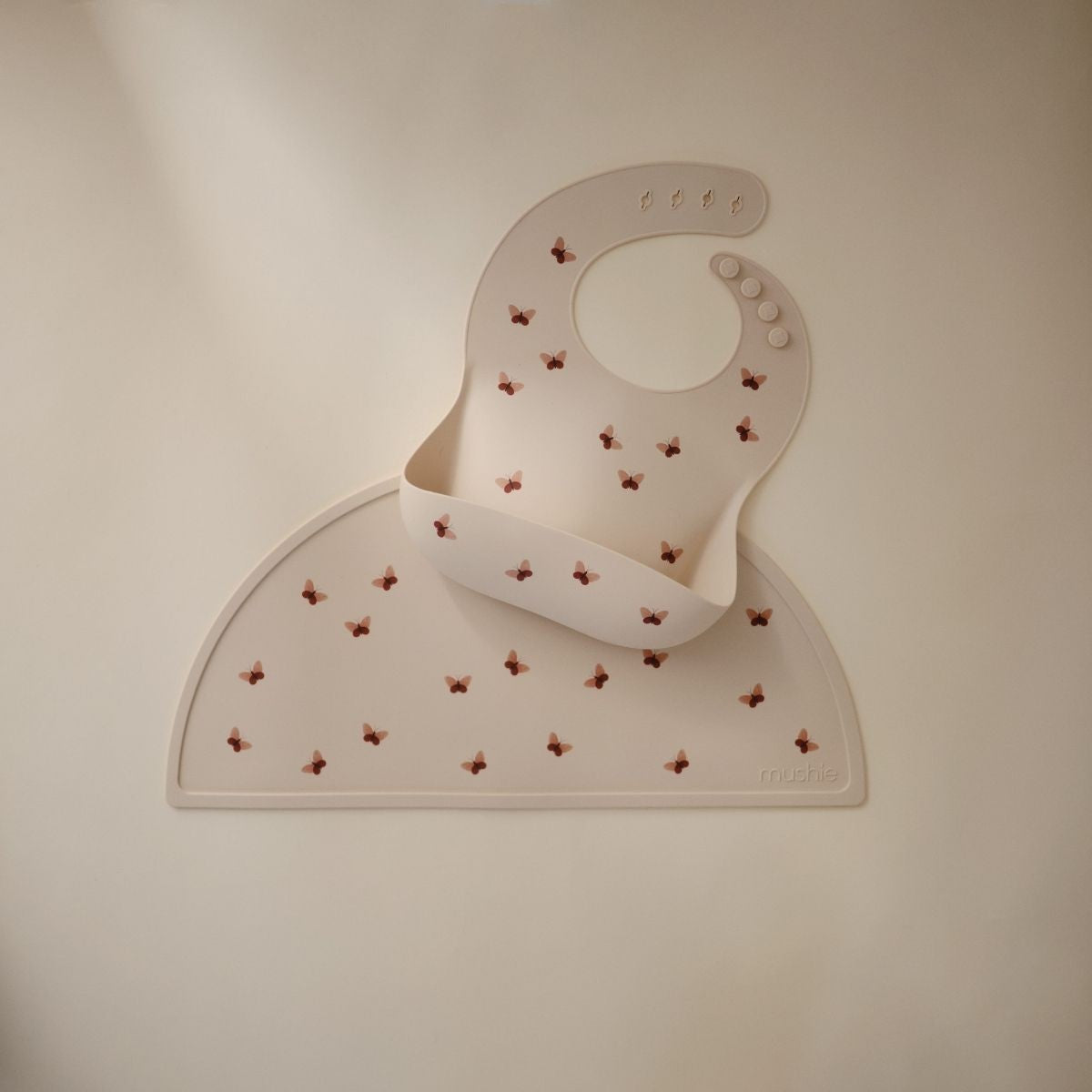 Mushie placemat butterflies