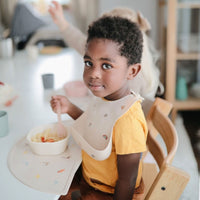 Mushie placemat dino