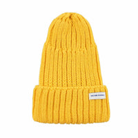 We are gommu poppenbeanie Yellow 18 mnd+