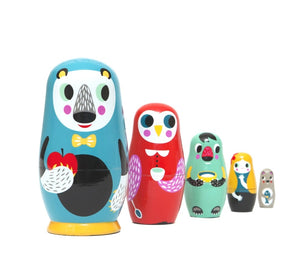 Petit Monkey nesting dolls in the woods